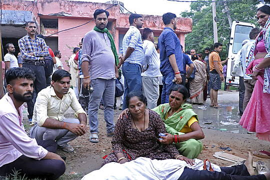 At least 100 people killed in stampede at religious event in India