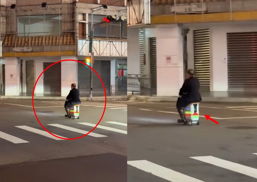 台中有民眾拍下，一名禿頭老伯在大馬路上，違規騎乘電動行李箱，相當危險。（翻攝爆料公社）
